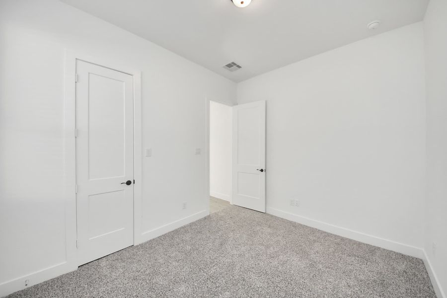 Spacious, unfurnished interior of a new home in Meridiana, Manvel (Image 43).