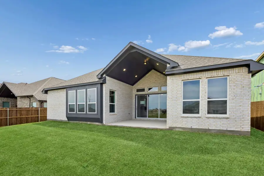 Exterior details and patio area of a home in Oaks of North Grove, Waxahachie (Image 4). Exterior details and patio area of a home in Oaks of North Grove, Waxahachie (Image 4).