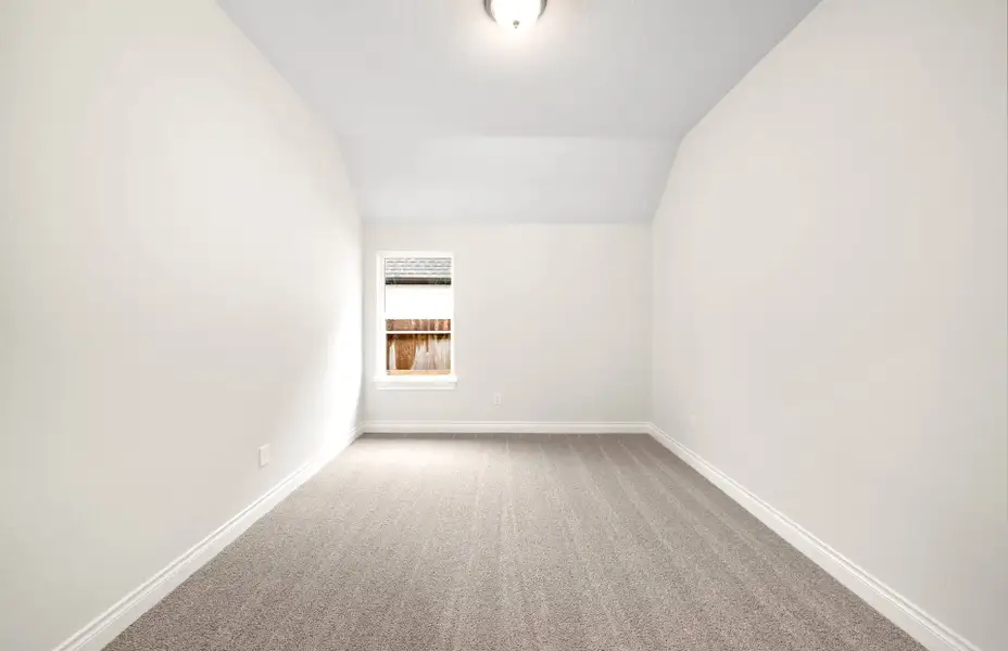 Representative unfurnished interior of a home built from the 3068 by Ravenna Homes in The Woodlands Hills 65′, Willis (Image 40).