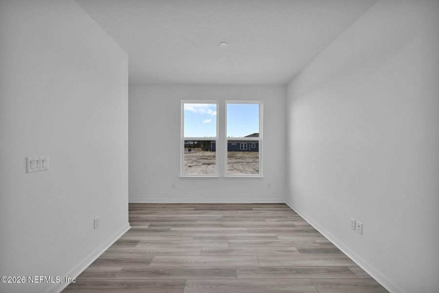 Spacious, unfurnished interior of a new home in Del Webb Wildlight, Yulee (Image 15).