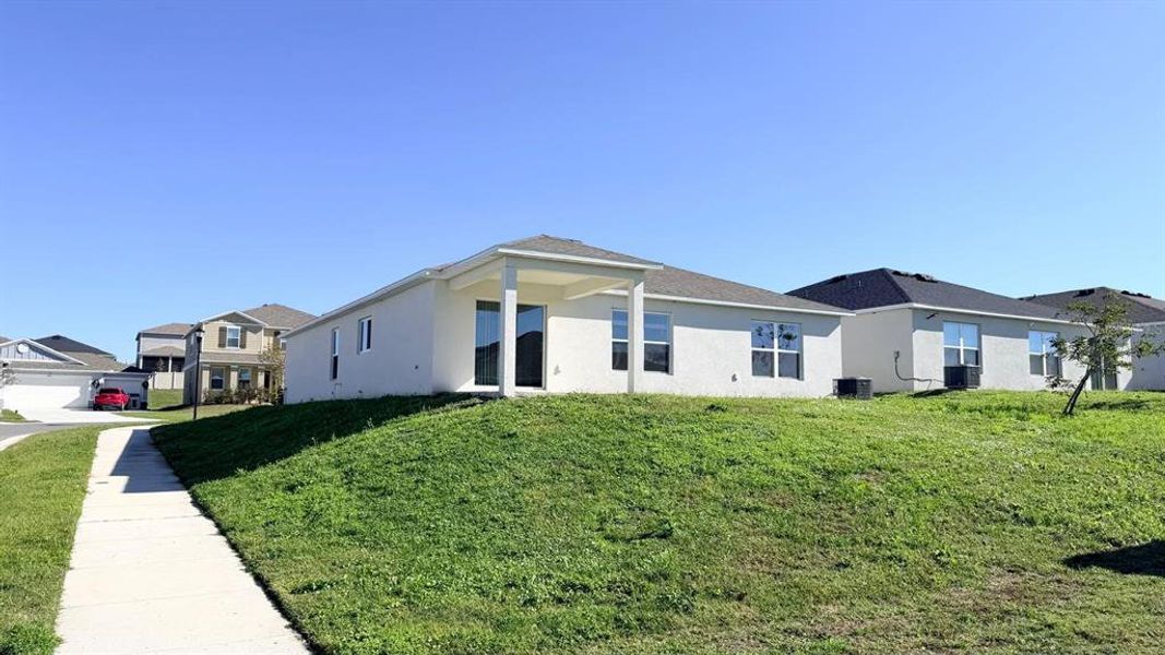 Exterior details and patio area of a home in Lake Lucerne, Winter Haven (Image 3).