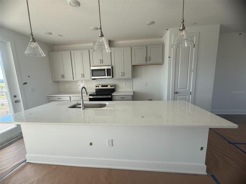 In-progress construction of a new home in Parkview at Hamlin, Winter Garden, FL (Image 21).