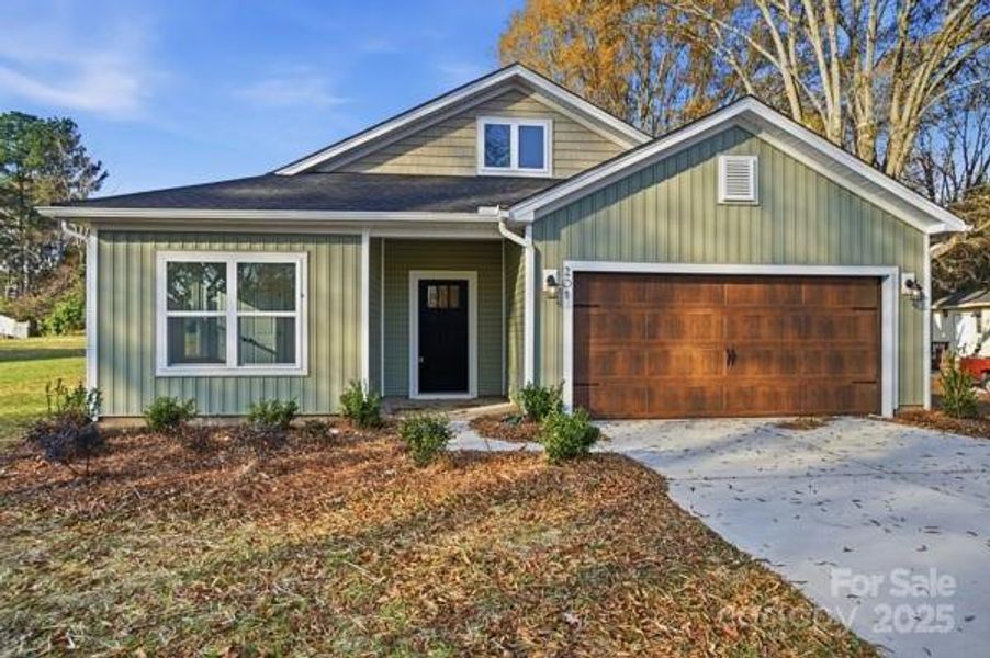 Front exterior of a new home in , Cherryville, NC, highlighting curb appeal (Image 1).