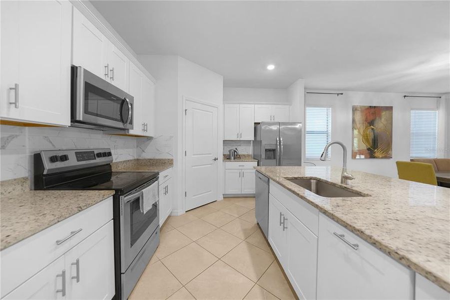 Furnished interior view inside a new home in , Port Charlotte (Image 5). Furnished interior view inside a new home in , Port Charlotte (Image 5).