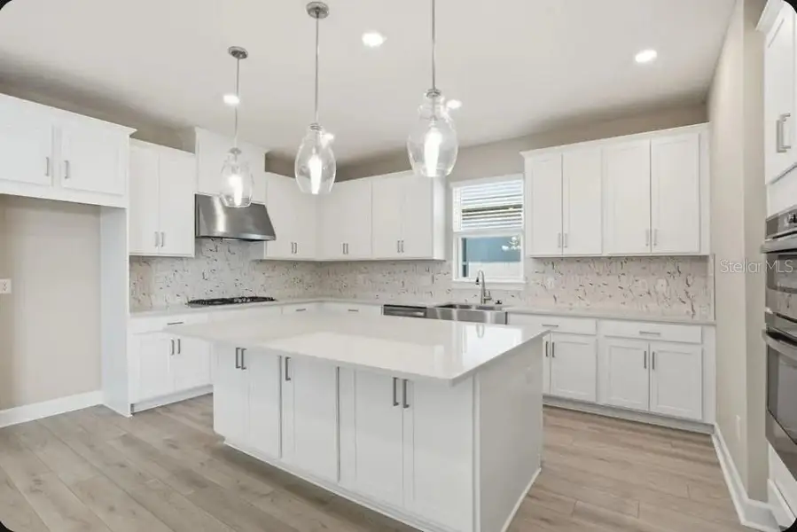 Furnished interior view inside a new home in Coasterra Community Group Page, Palmetto (Image 3).