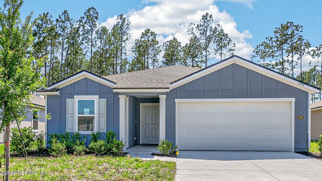 Front exterior of a new home in Copes Landing, Jacksonville, FL, highlighting curb appeal (Image 2).