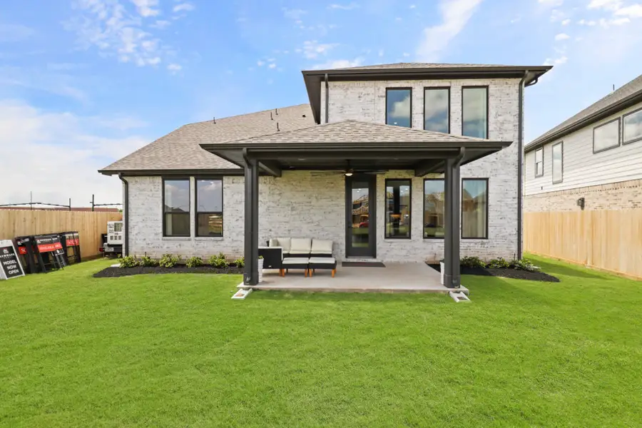 Exterior details and patio area of a home in Harvest Green 50', Richmond (Image 4).