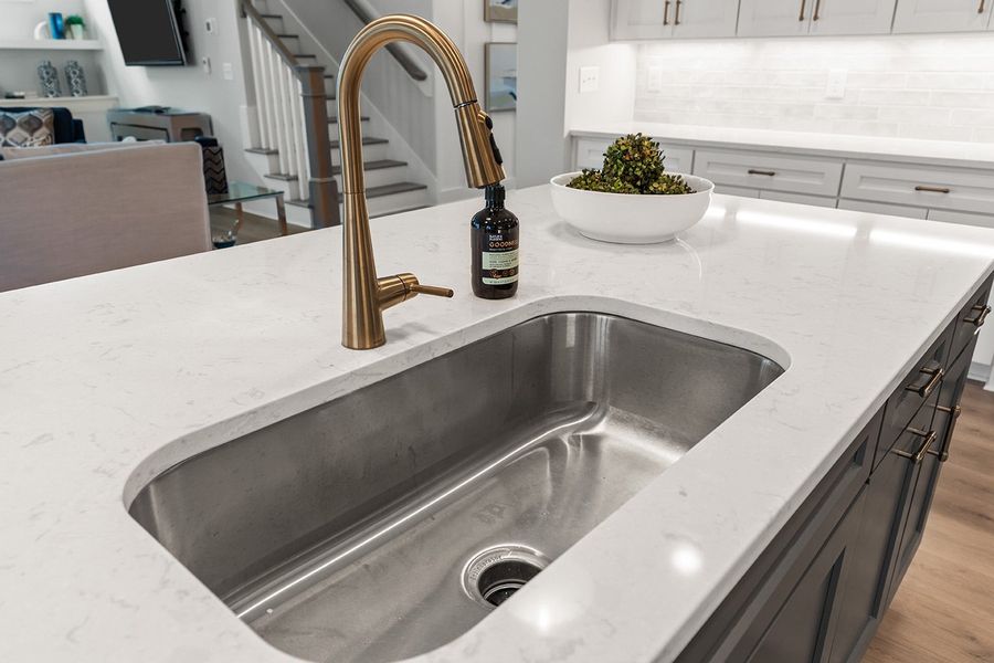 Representative furnished interior of a home built from the The Hampton by RobuckHomes in Windwater, Hampstead (Image 12).