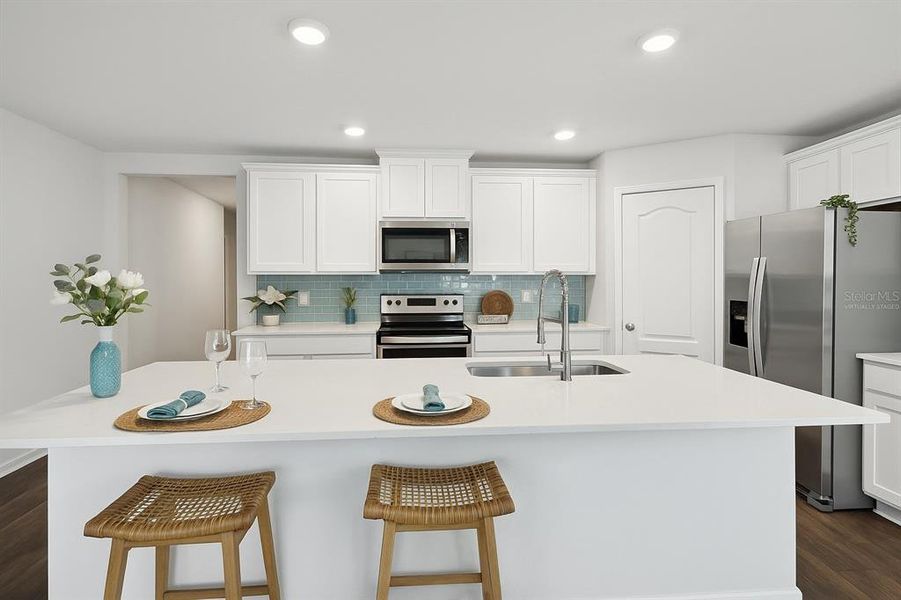 Virtually staged and designed. (currently no backsplash)