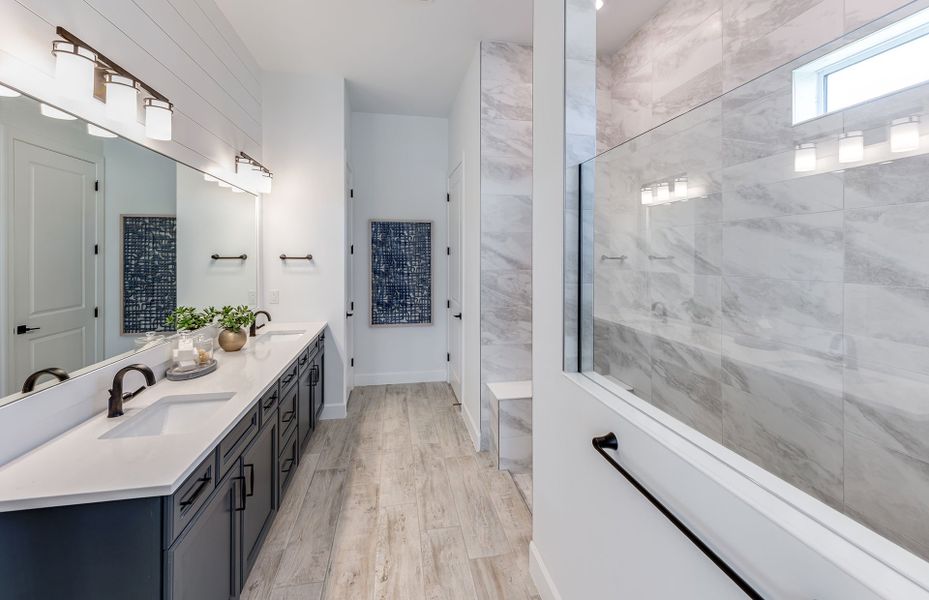 Walk-in shower in the owner's spa like bathroom Walk-in shower in the owner's spa like bathroom