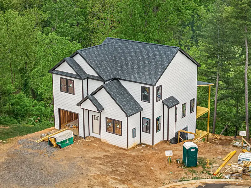 Front exterior of a new home in , Asheville, NC, highlighting curb appeal (Image 1). Front exterior of a new home in , Asheville, NC, highlighting curb appeal (Image 1).