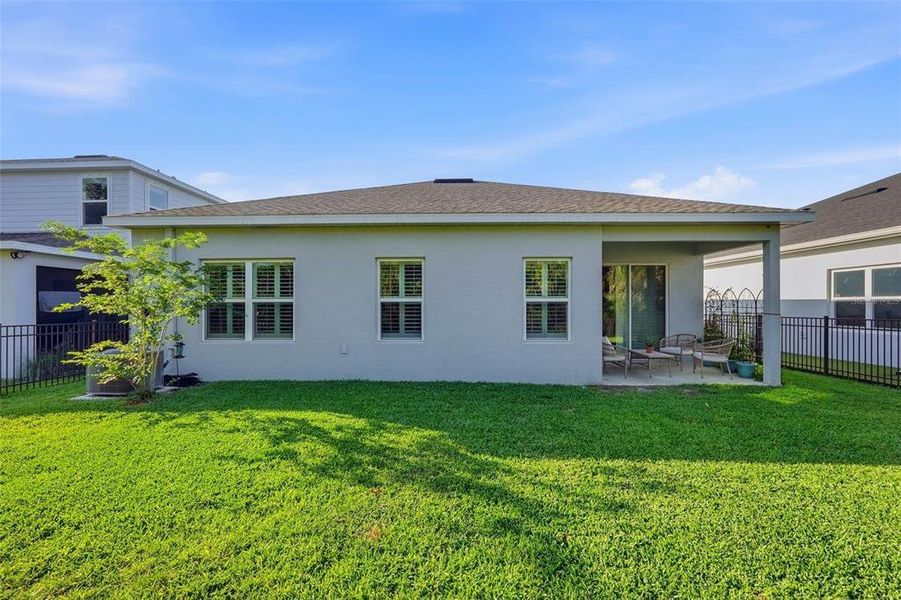 Exterior details and patio area of a home in , Parrish (Image 24).