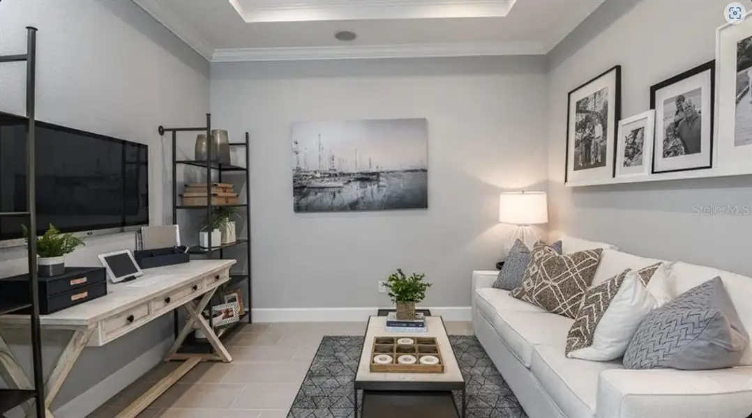 Furnished interior view inside a new home in Esplanade at Wellen Park, Englewood (Image 9).