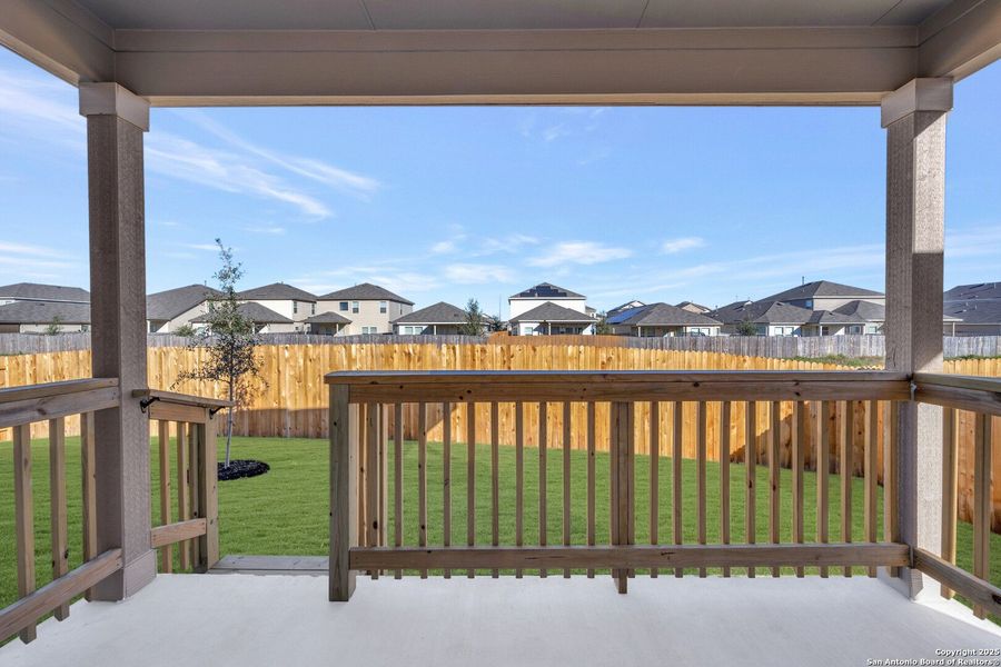 Exterior details and patio area of a home in Winding Brook, San Antonio (Image 26).