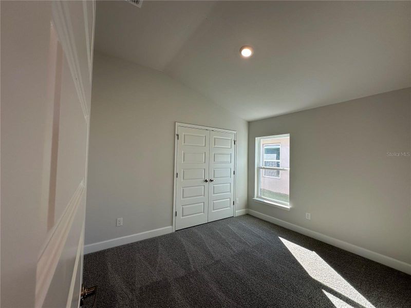 Spacious, unfurnished interior of a new home in Densan Park, Wildwood (Image 21).