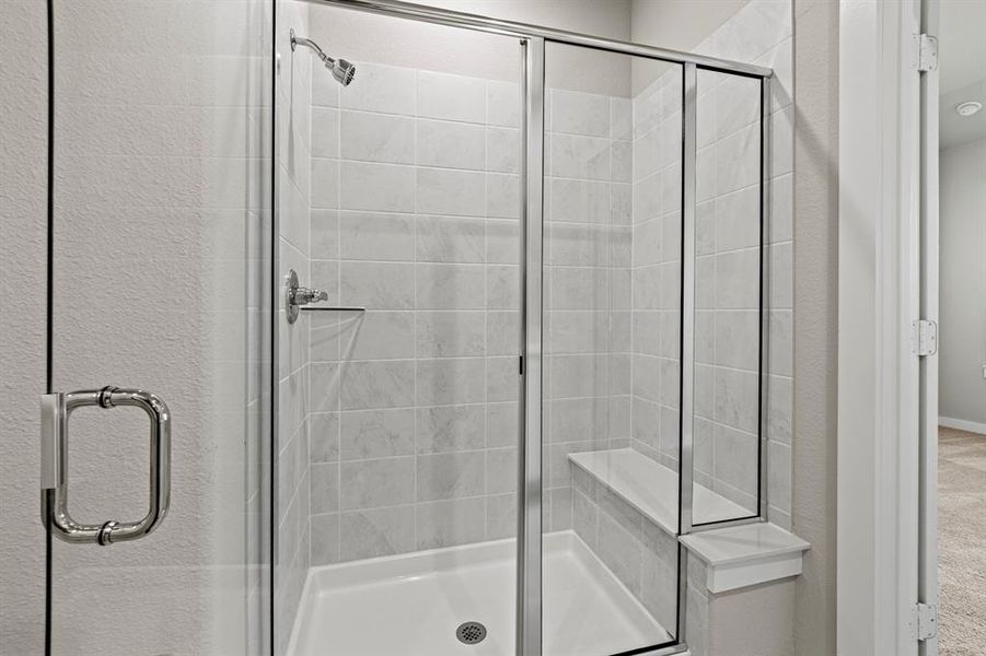 Bathroom featuring walk in shower