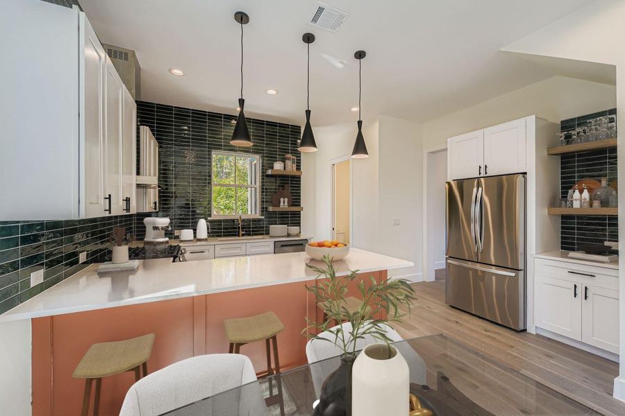 Kitchen with open shelves, backsplash, white cabinets, appliances with stainless steel finishes, and recessed lighting Kitchen with open shelves, backsplash, white cabinets, appliances with stainless steel finishes, and recessed lighting