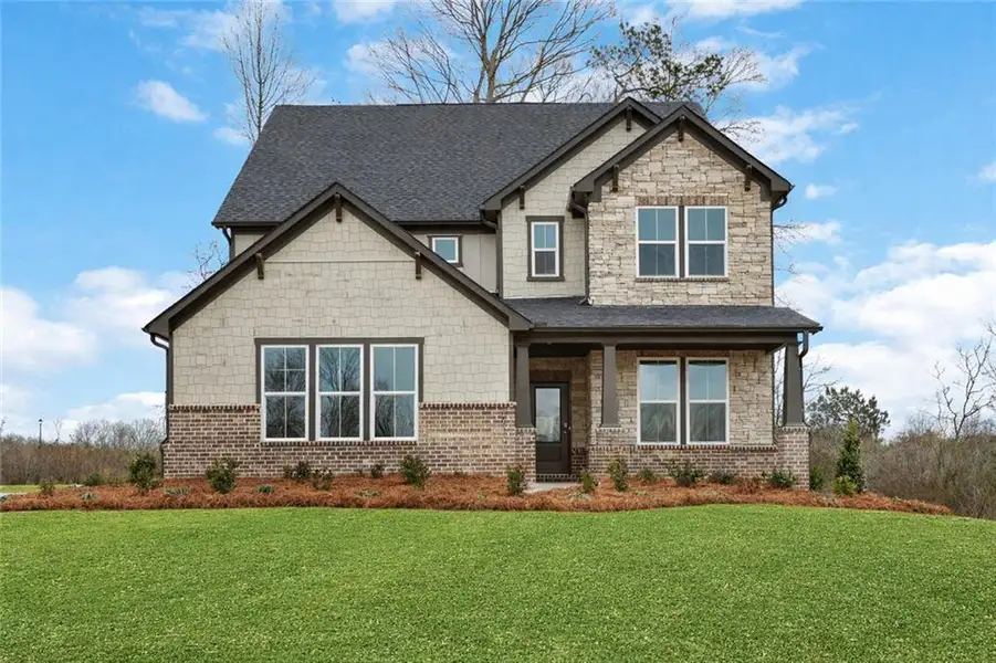 Front exterior of a new home in Acacia, Cumming, GA, highlighting curb appeal (Image 1). Front exterior of a new home in Acacia, Cumming, GA, highlighting curb appeal (Image 1).