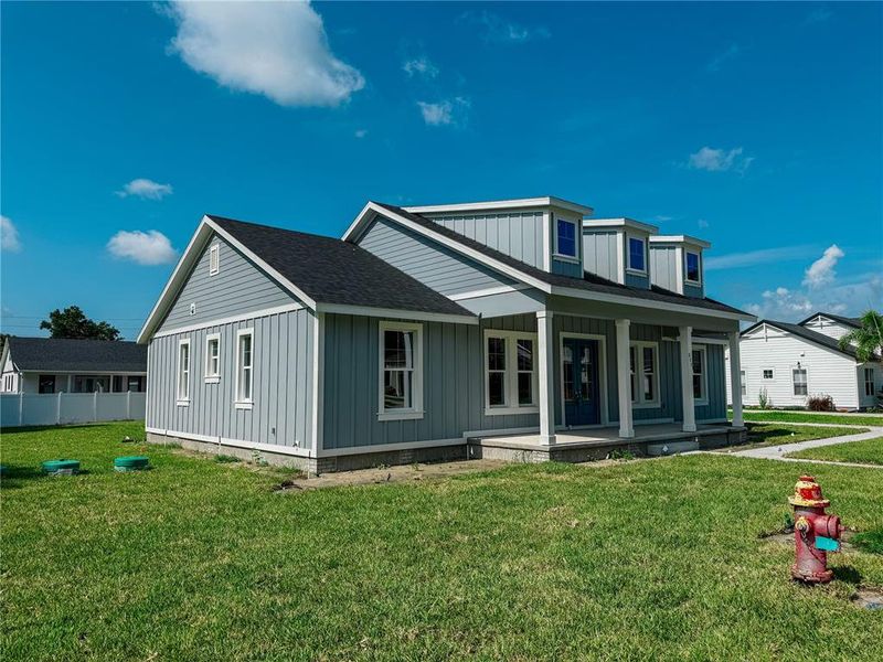 Front exterior of a new home in , Lake Helen, FL, highlighting curb appeal (Image 25). Front exterior of a new home in , Lake Helen, FL, highlighting curb appeal (Image 25).