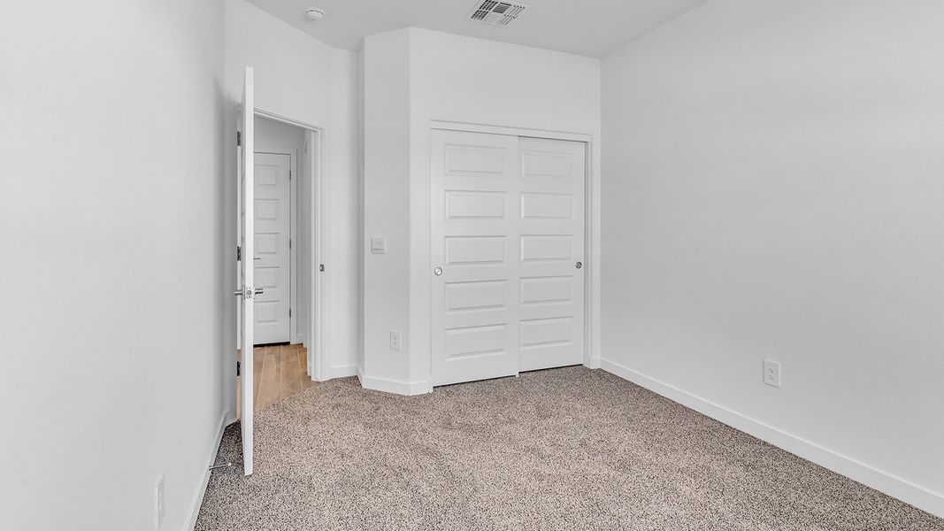 Representative unfurnished interior of a home built from the Parker by D.R. Horton in The Oasis at Rocking K, Vail (Image 18).