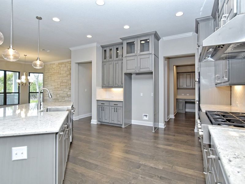 Representative furnished interior of a home built from the Madera II by Giddens Homes in Scofield Farms Estates, Georgetown (Image 177).