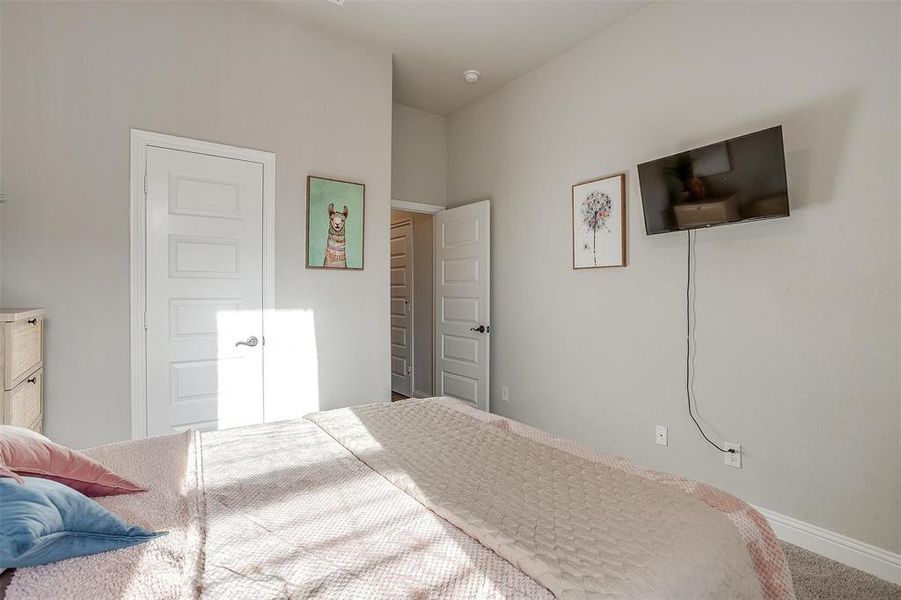 Bedroom with carpet flooring