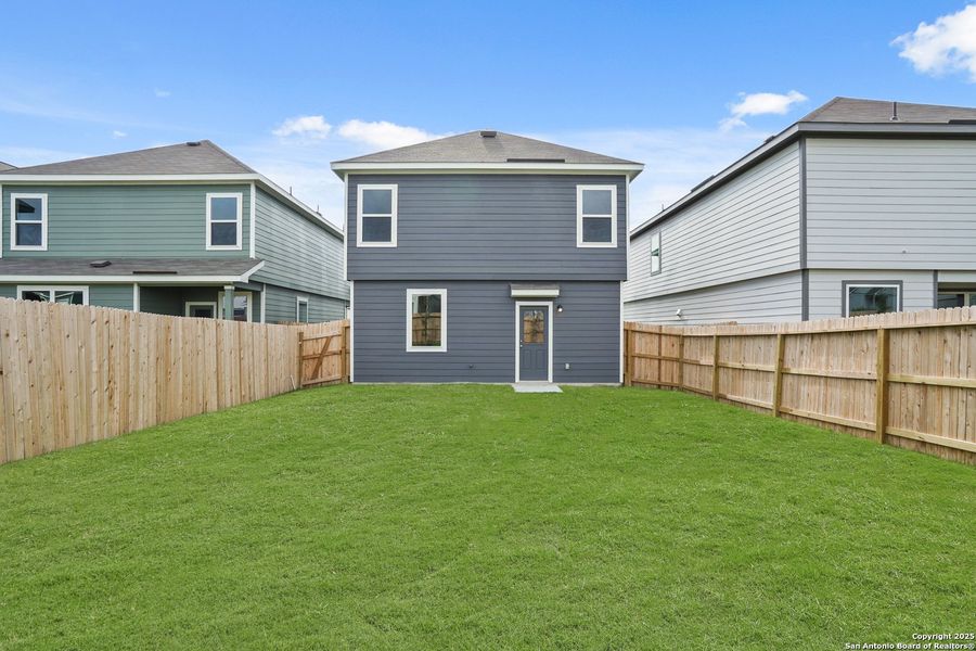 Front exterior of a new home in Melissa Ranch, San Antonio, TX, highlighting curb appeal (Image 17).