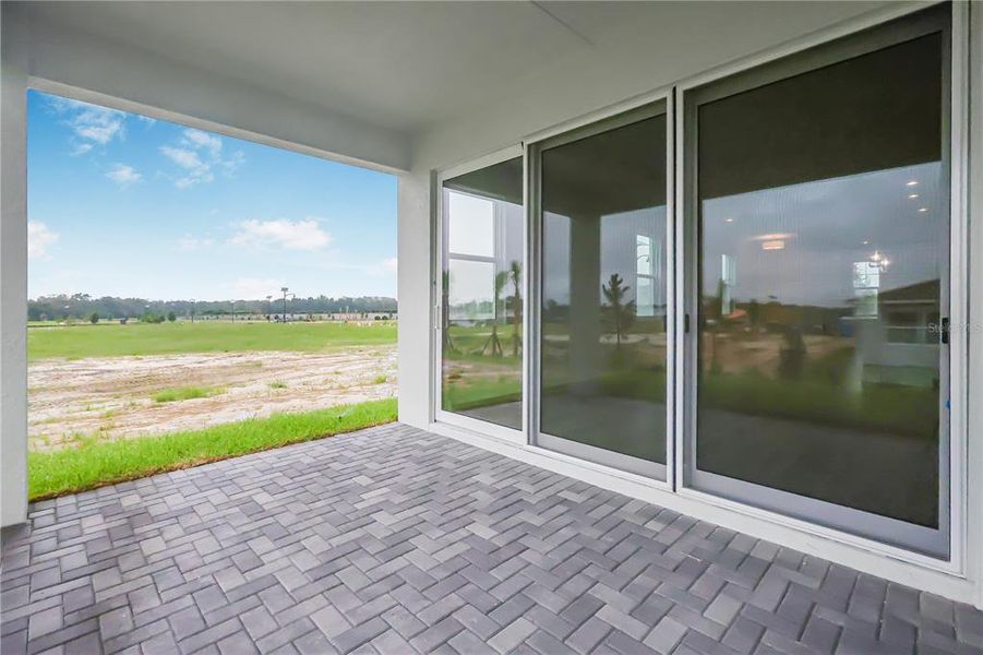 Exterior details and patio area of a home in Cresswind at Hammock Oaks, Lady Lake (Image 29).