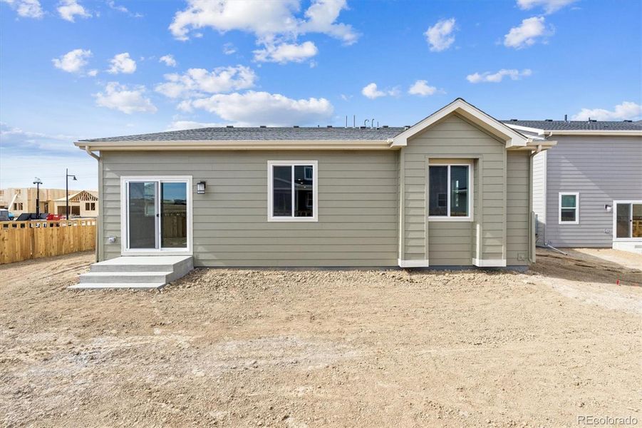 Exterior details and patio area of a home in Sweetgrass, Dacono (Image 3).