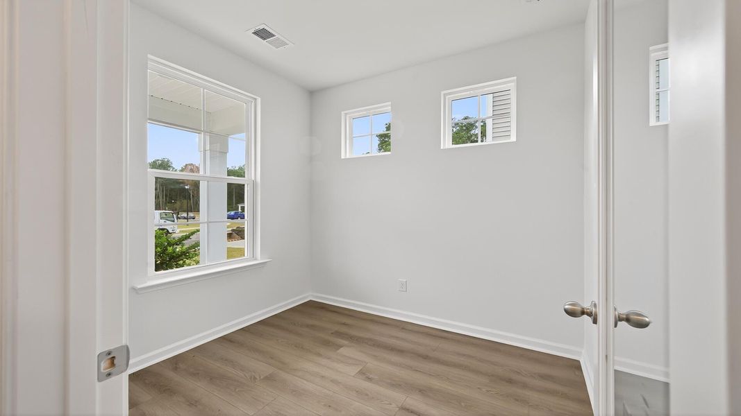 Spacious, unfurnished interior of a new home in Creekside at Andrews, Summerville (Image 17).