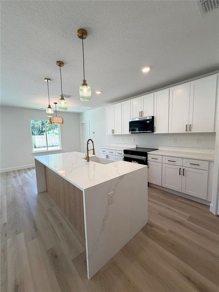 Furnished interior view inside a new home in , Summerfield (Image 12).