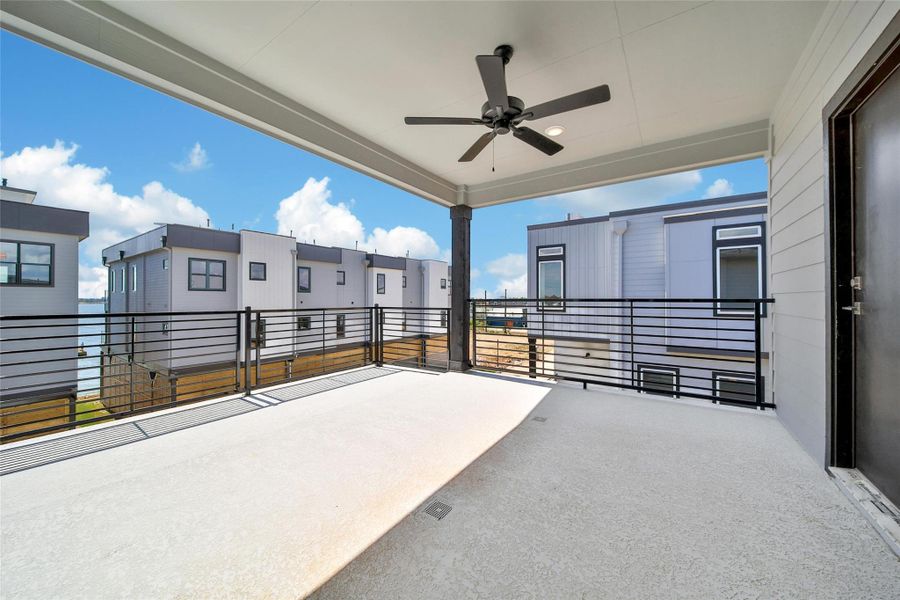 Exterior details and patio area of a home in Lago Pointe, Seabrook (Image 18).