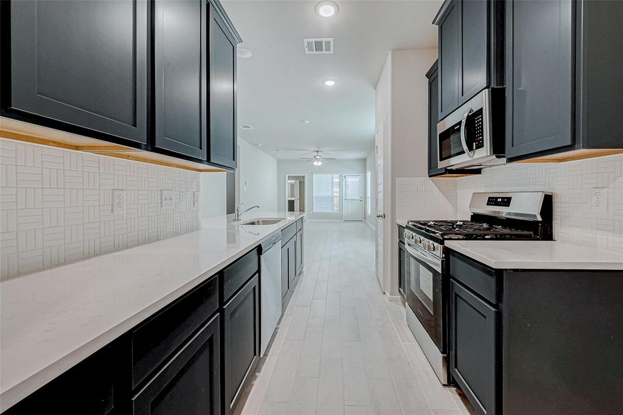 Furnished interior view inside a new home in Woodland Lakes, Huffman (Image 8).