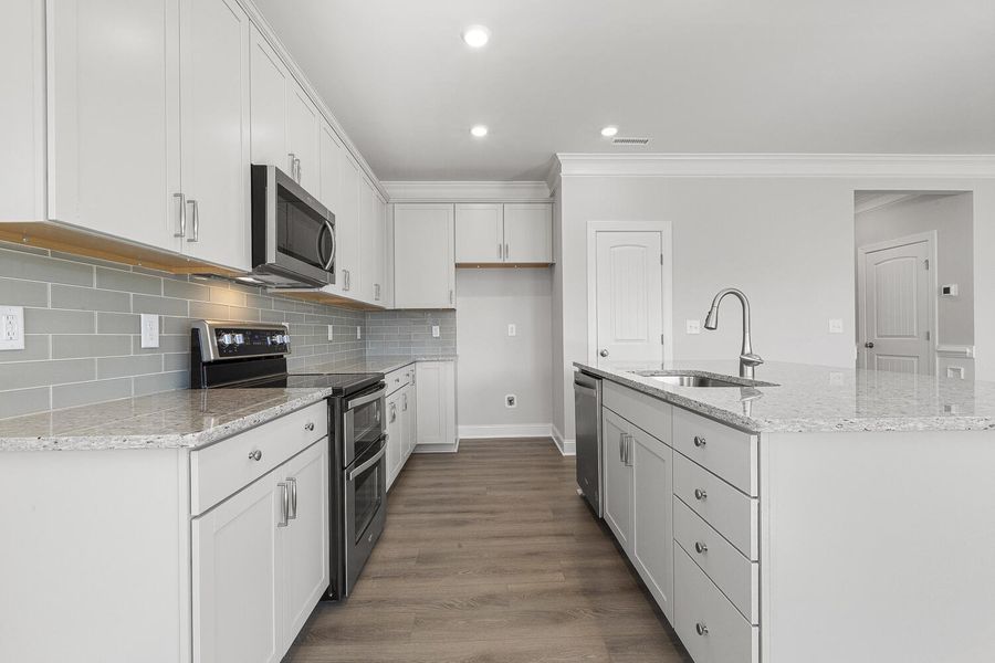 Furnished interior view inside a new home in 1158 Place, Wilson (Image 16).