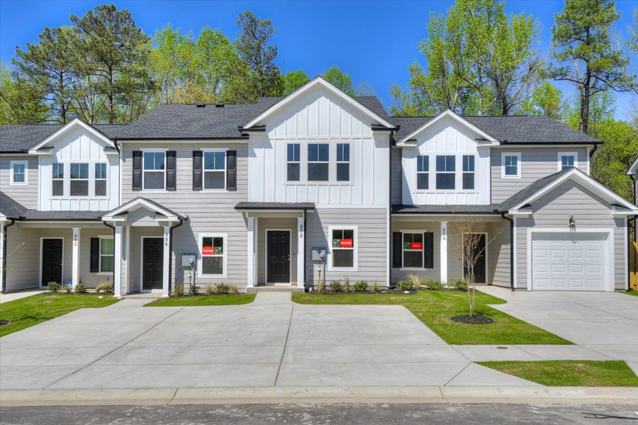 Front exterior of a new home in Forrest Bluff Townhomes, North Augusta, SC, highlighting curb appeal (Image 1).