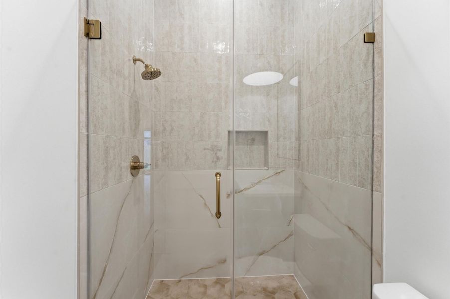 Large shower for guest suite.