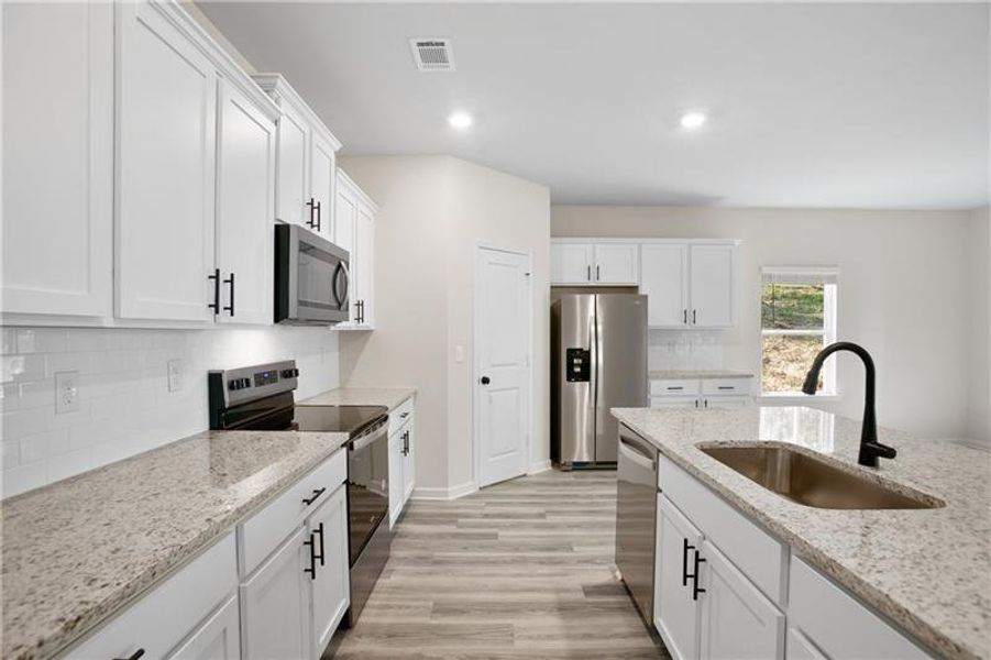 Furnished interior view inside a new home in , Buford (Image 12).