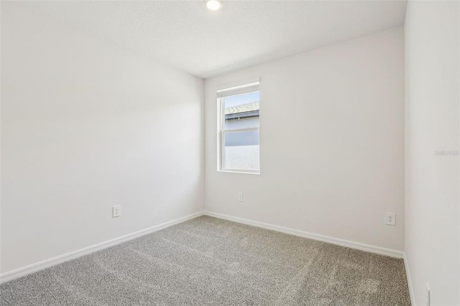 Spacious, unfurnished interior of a new home in Bradbury Creek - Signature Series, Haines City (Image 30).