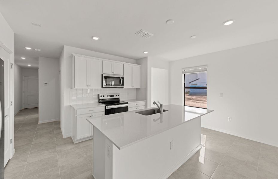 Furnished interior view inside a new home in Whispering Lakes, Lehigh Acres (Image 17).