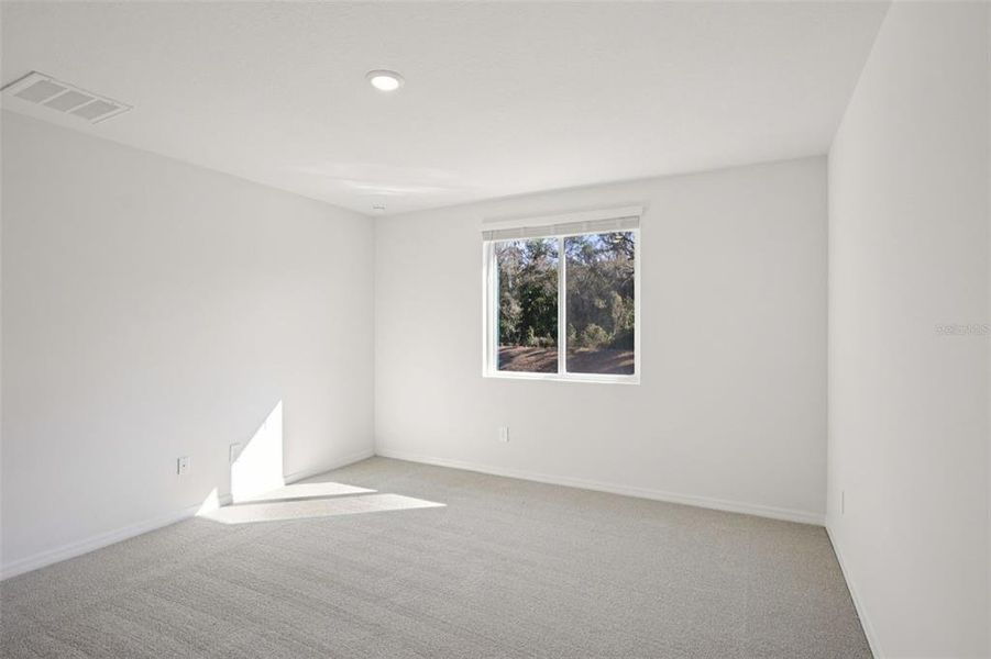 Spacious, unfurnished interior of a new home in Leyland Preserve - Classic Series, Brooksville (Image 26).