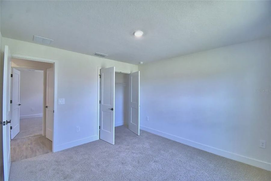 Spacious, unfurnished interior of a new home in Lake Juliana Estates, Auburndale (Image 26).