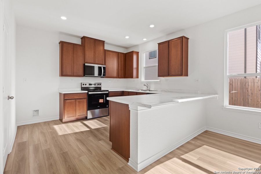 Furnished interior view inside a new home in Woodside Farms, Seguin (Image 6).
