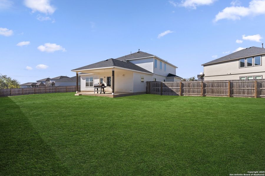 Exterior details and patio area of a home in Hickory Ridge, Elmendorf (Image 25).