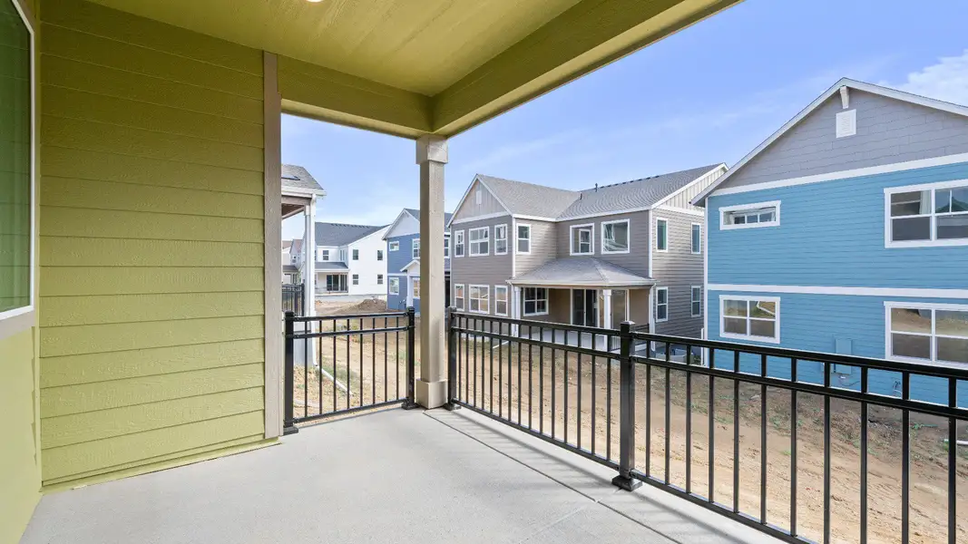 Exterior details and patio area of a home in Dillon Pointe - Journey, Broomfield (Image 4).