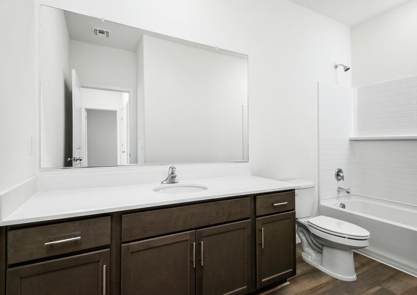 Spacious guest bathrooms are perfect for guests to get ready.