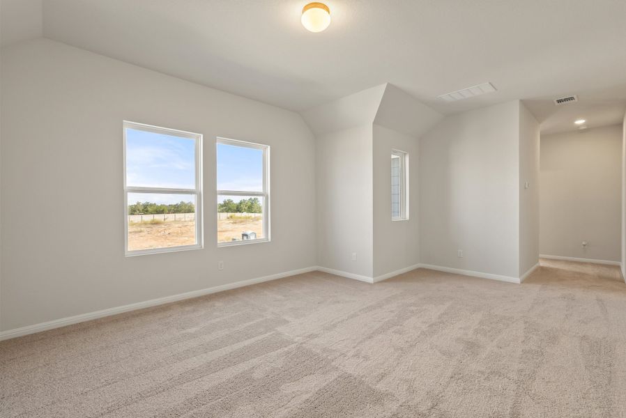 Representative unfurnished interior of a home built from the Somerville by Ashton Woods in Willow Springs, Buda (Image 37).