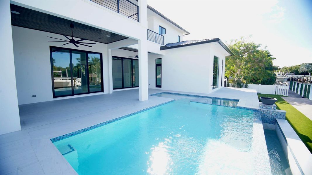 Exterior details and patio area of a home in , Palm Beach Gardens (Image 37).