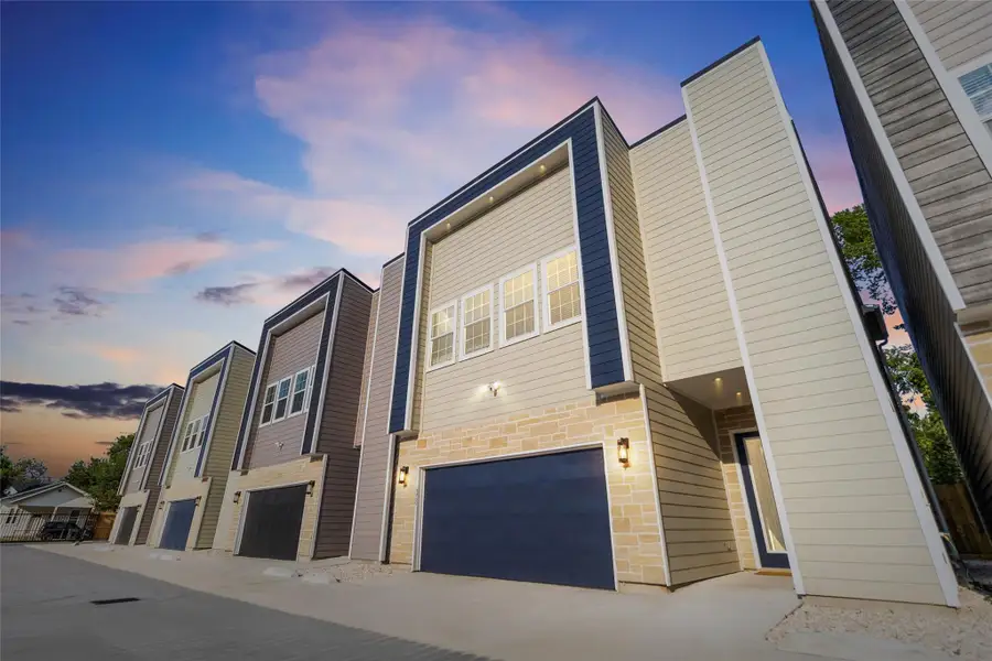 Every day starts with pride as you pull up to your modern two-story home, its bold navy accents and stonework setting the stage for a lifestyle that’s as stylish as it is comfortable. The sleek lines of your façade give your place a fresh, standout curb appeal. Every day starts with pride as you pull up to your modern two-story home, its bold navy accents and stonework setting the stage for a lifestyle that’s as stylish as it is comfortable. The sleek lines of your façade give your place a fresh, standout curb appeal.