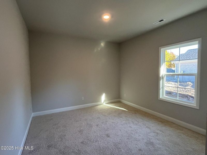Spacious, unfurnished interior of a new home in Palmetto Creek, Bolivia (Image 26).
