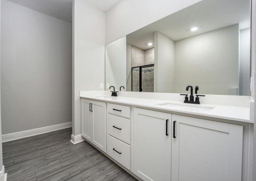 A double sink vanity in the master bathroom